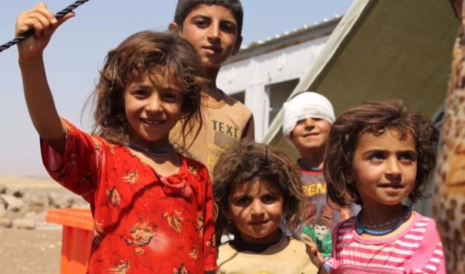 Children look at the camera