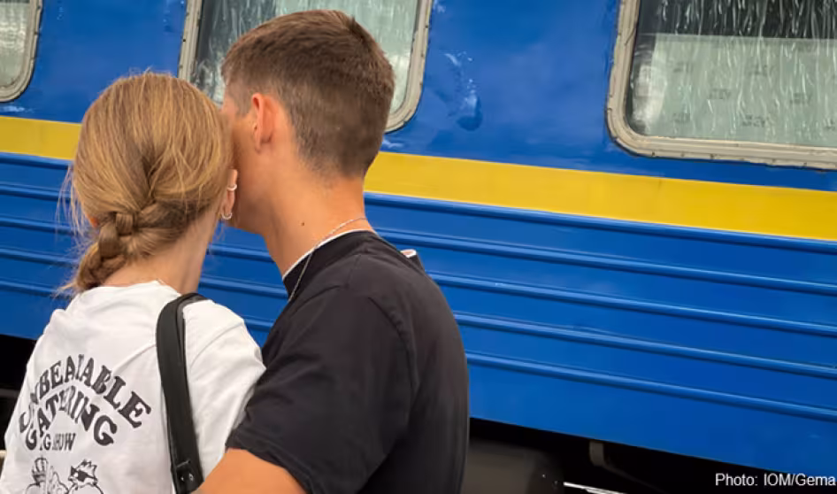 The backs of two people.
