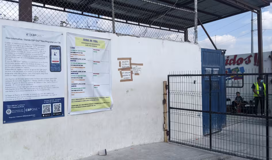 Photo of CBP One App poster at shelter in Reynosa, Mexico