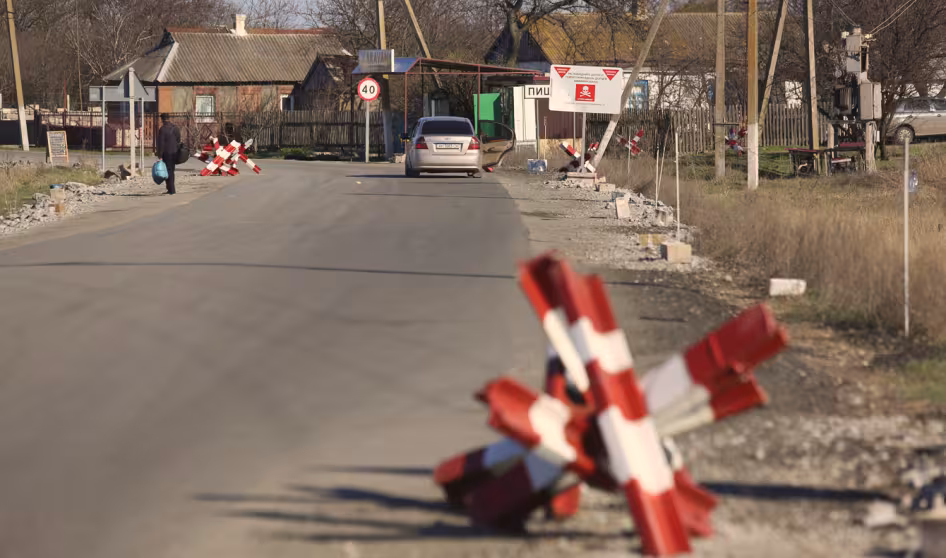 Scene of Ukrainian street with barricades.
