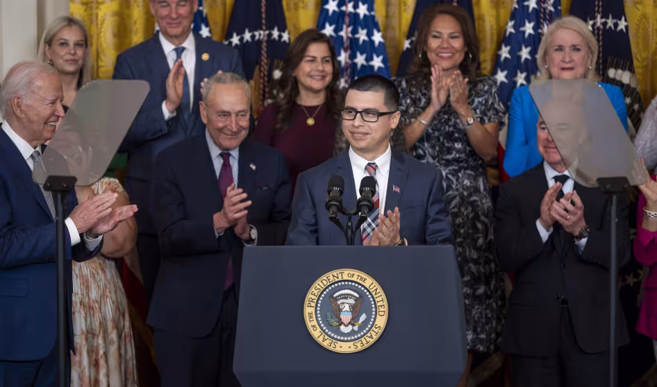 A DACA recipient speaks at a DACA 12th anniversary event at the White House