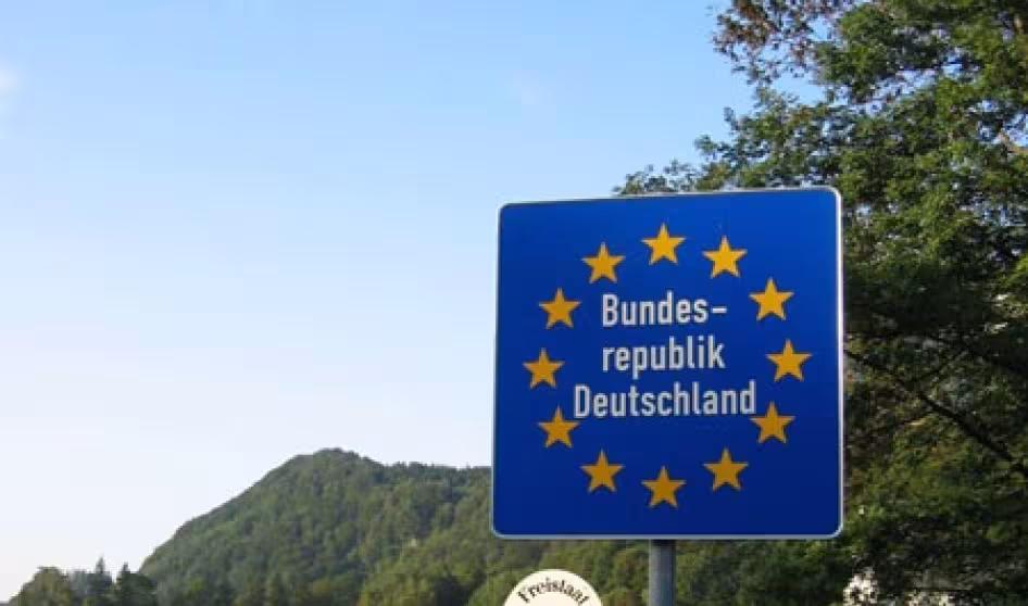 Image of road sign denoting entry into Germany