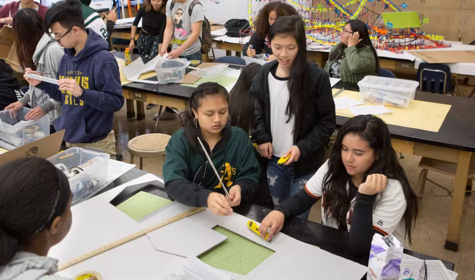 High school students work on a science project