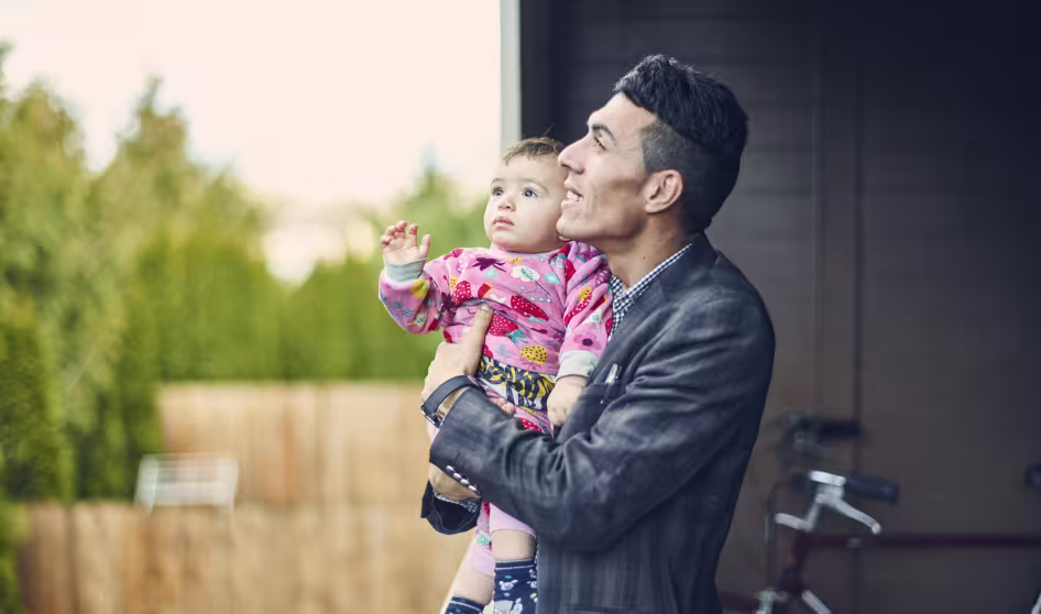 Iraqi refugee father and son