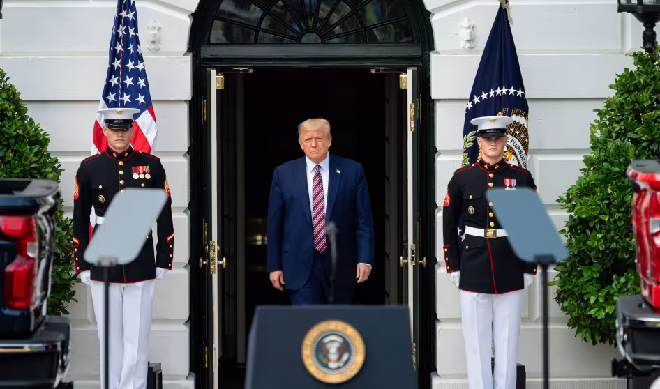 President Trump emerges from the White House to deliver remarks