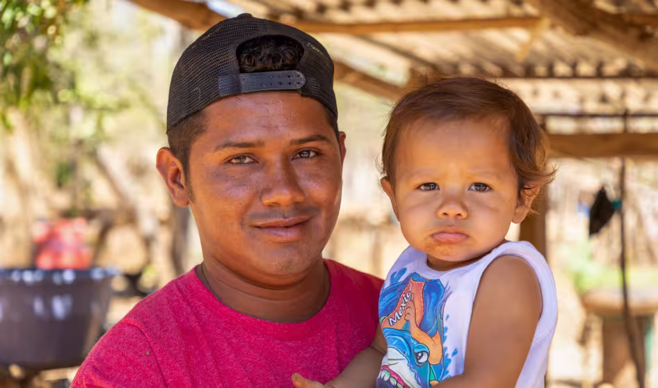 A Honduran man and child