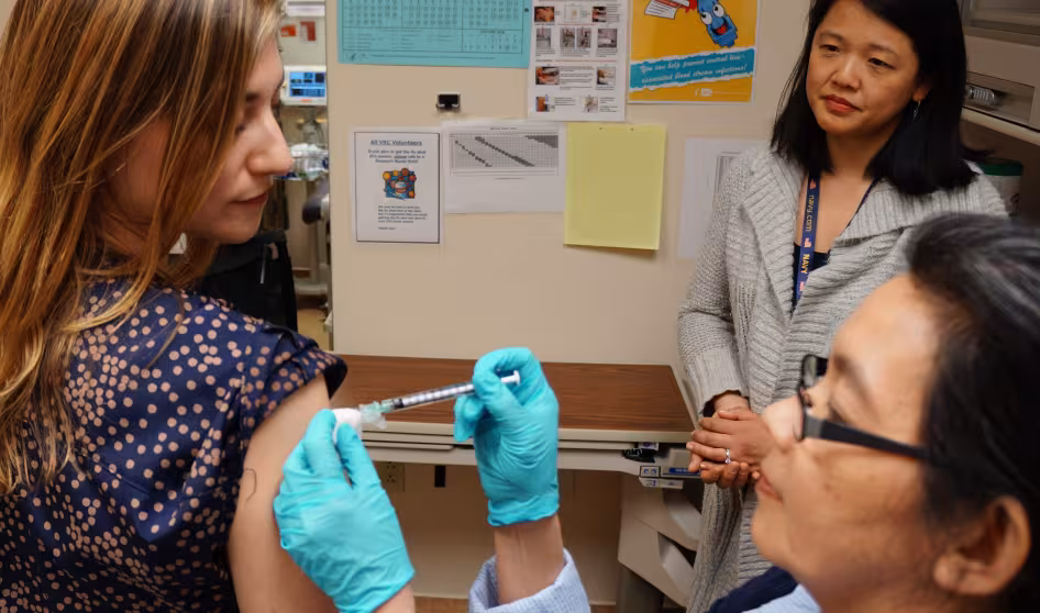A woman getting a vaccine
