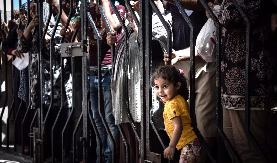 Young Iraqi girl at a registration center in Greece