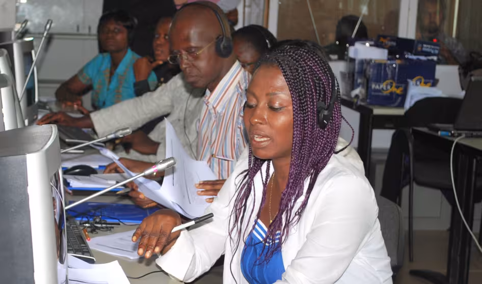Participants in a program matching Ghanaian workers to jobs in Italy