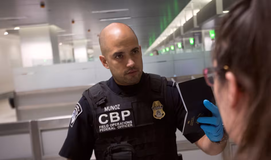 CBP officer screening travelers