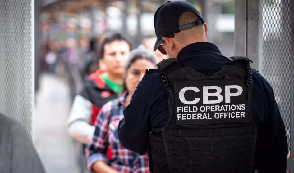 CBP officers screen border crossers at the San Ysidro Port of Entry
