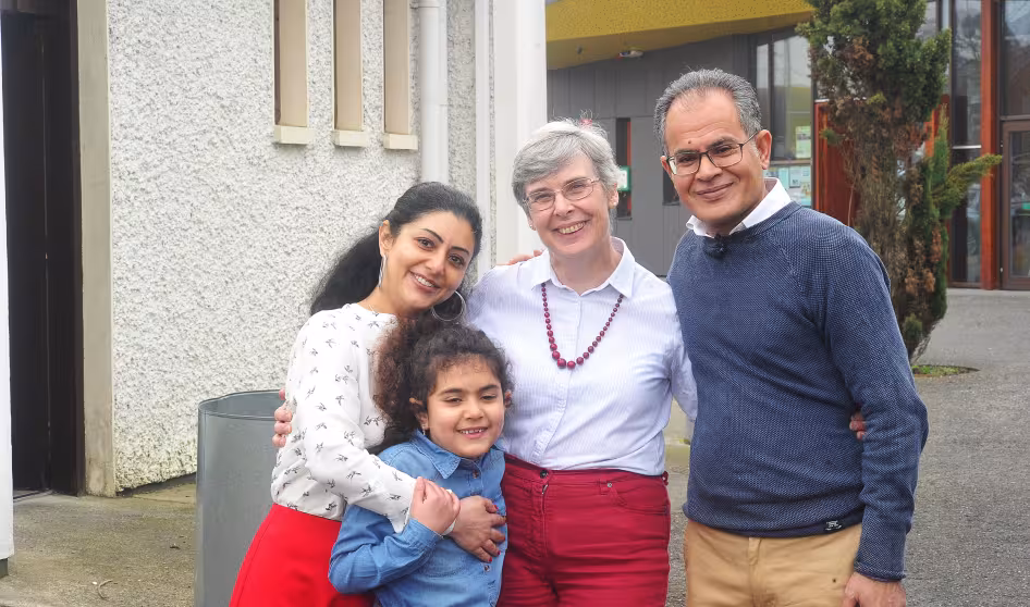 Syrian family and an Irish volunteer in a community sponsorship program