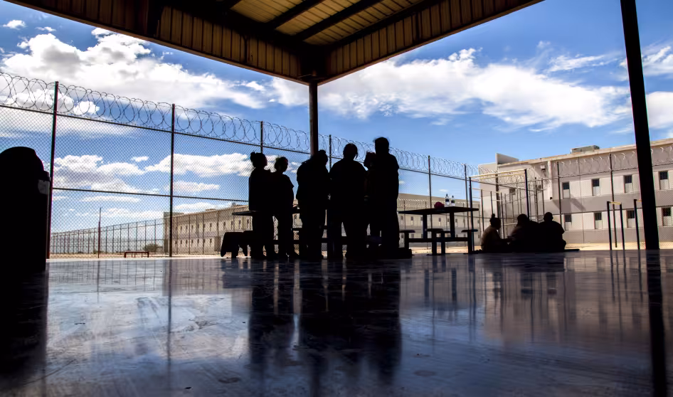 Immigrants in an outdoor space at Eloy Federal Contract Facility