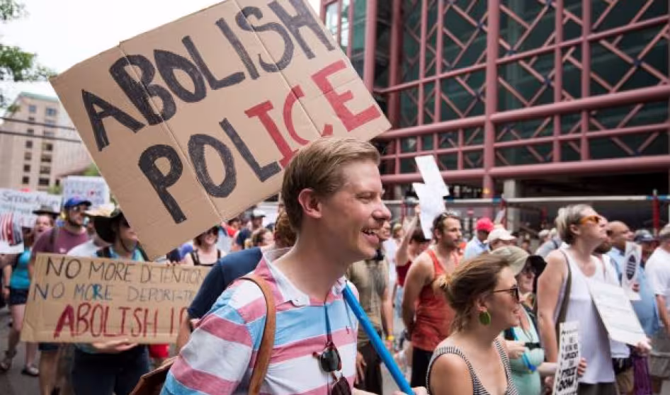Protesters at a rally in Minneapolis call for abolishing ICE