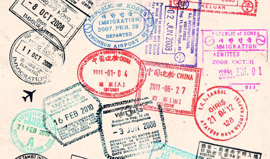 Image of passport page with variety of stamps