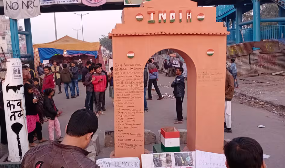Photo of India gate in Delhi, India featuring names of protestors killed in anti-Citizenship Act demonstrations