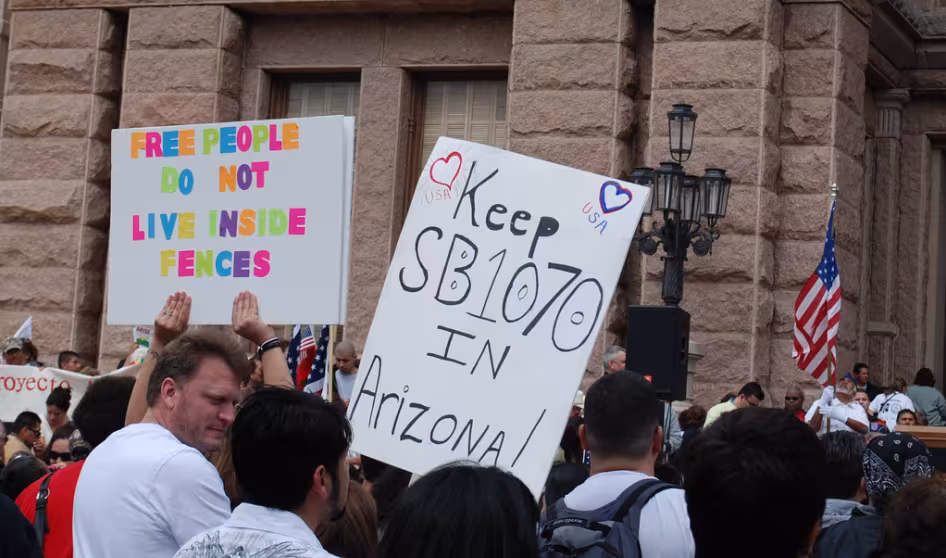 Protesters demonstrate against immigration proposals outside the Texas State Capitol.