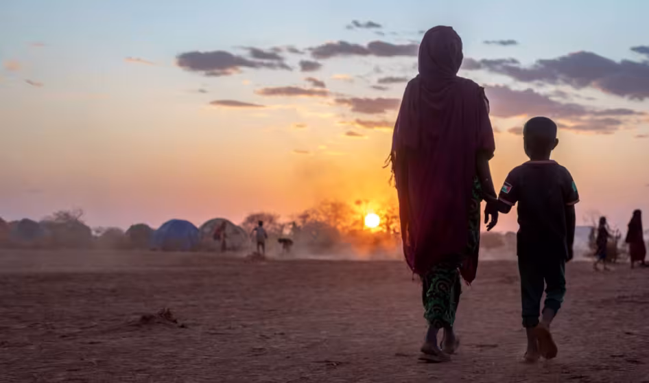 A woman and child walk in the Somali region of Ethiopia.