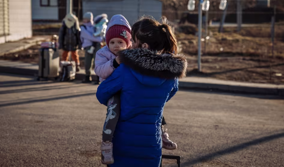 A woman and child at the Moldova-Ukraine border