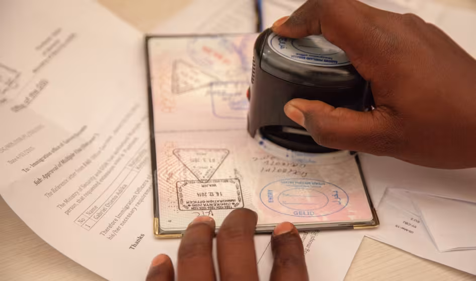 A travel document being stamped in Somalia.