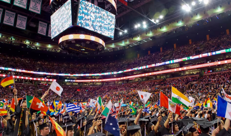 International students wave flags of their origin countries