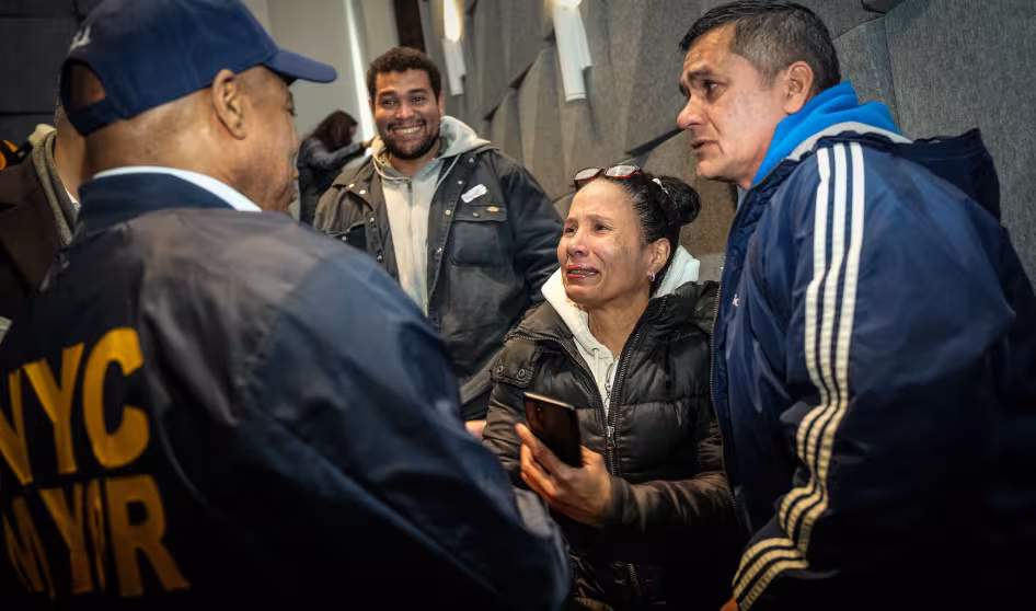 New York City Mayor Eric Adams meeting with asylum seekers. 