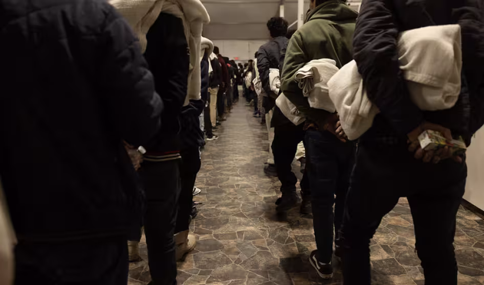Unauthorized immigrants in the process of being deported from the United States.