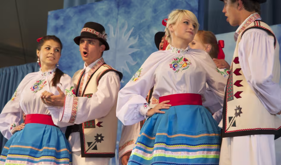 Four dancers in traditional Ukrainian dress.