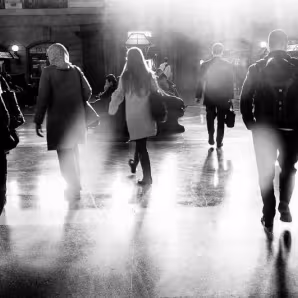 People in transit in a train station