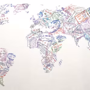 Passport stamps of different countries forming a world map.