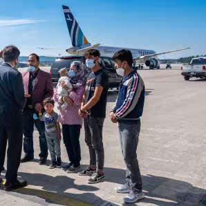 Photo of Secretary of State Antony J. Blinken meeting with Afghan evacuees in Germany