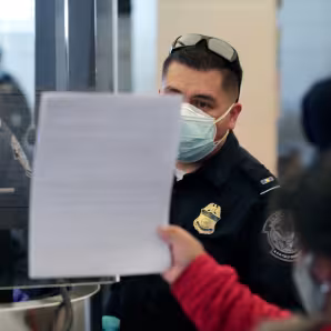 CBP agents process asylum seeker at El Paso, Texas port of entry