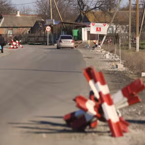 Scene of Ukrainian street with barricades.