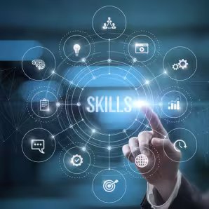Graphic image of man's hand touching screen with word skills 