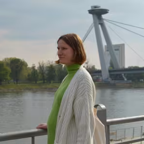 Ukrainian migrant looking out over bridge in Slovakia