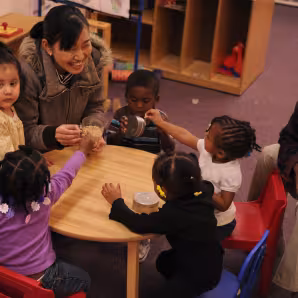 Head Start teacher and students