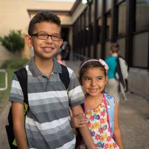 A brother and sister at school