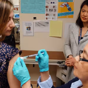 A woman getting a vaccine