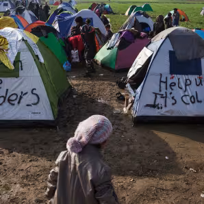 Refugees in makeshift camp on the border between Greece and the Former Yugoslav Republic of Macedonia.