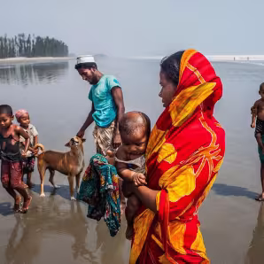Rohingya family on beach in Teknaf.