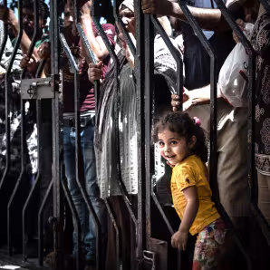 Young Iraqi girl at a registration center in Greece