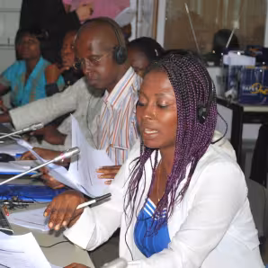 Participants in a program matching Ghanaian workers to jobs in Italy