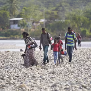 A family with Congolese, Angolan & Brazilian members after crossing the Darien Gap
