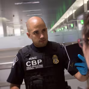 CBP officer screening travelers