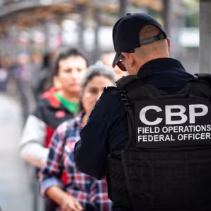 CBP officers screen border crossers at the San Ysidro Port of Entry
