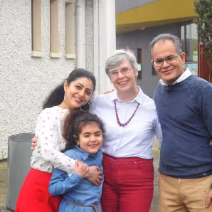 Syrian family and an Irish volunteer in a community sponsorship program