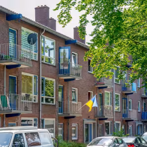 Ukraine flag hanging from an apartment building in the Netherlands