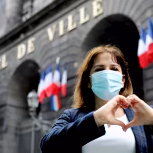 A Syrian refugee in France who has been assisting her neighbors during the pandemic