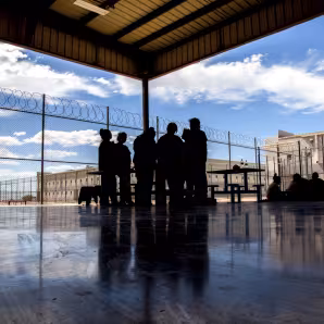 Immigrants in an outdoor space at Eloy Federal Contract Facility