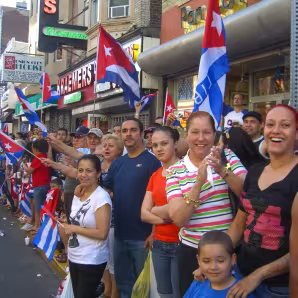 People celebrating a Cuban Day Parade